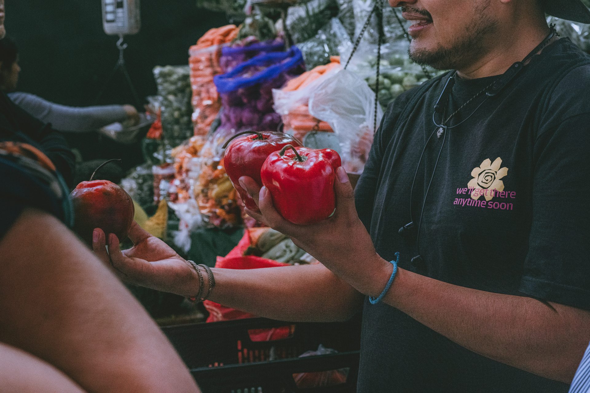 Colorful fruit and spice stalls inside an Arequipa market